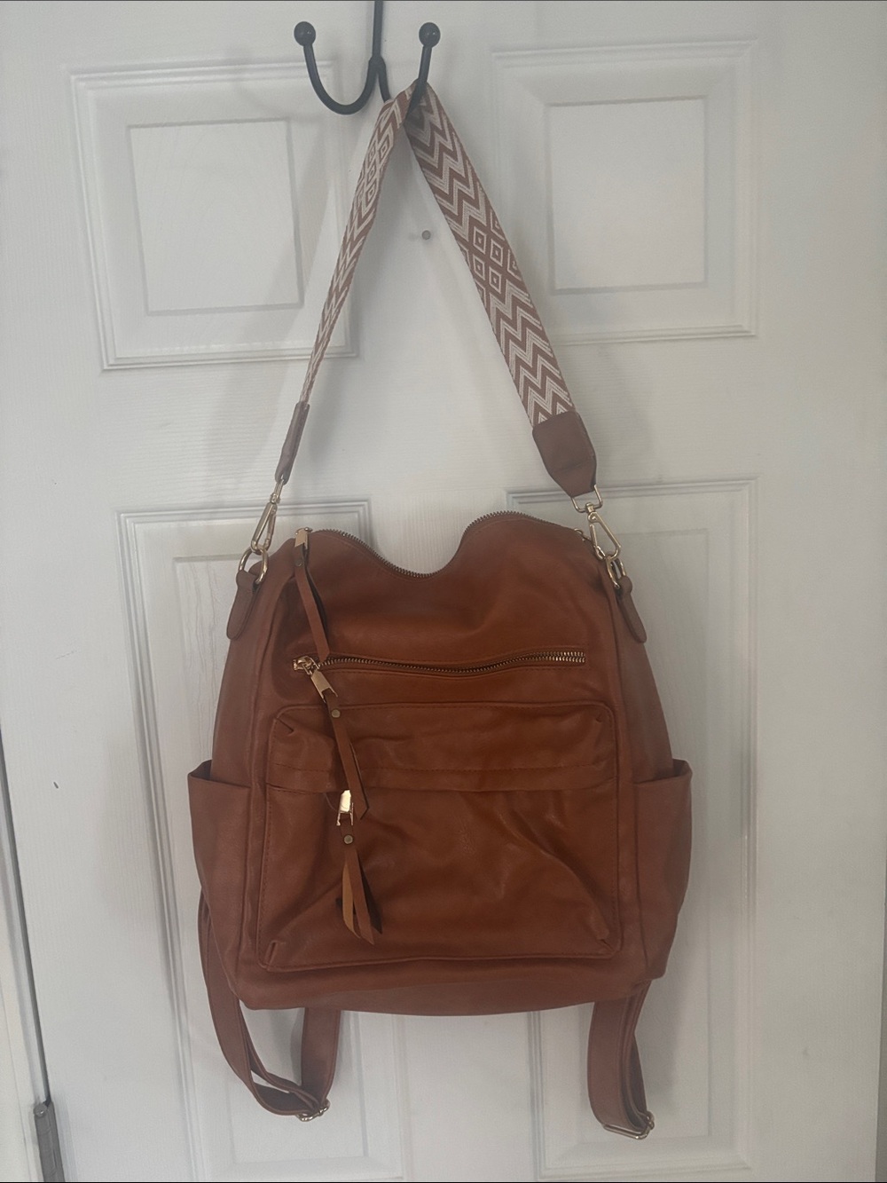 Women's Tan Leather Backpack Purse with Patterned Strap